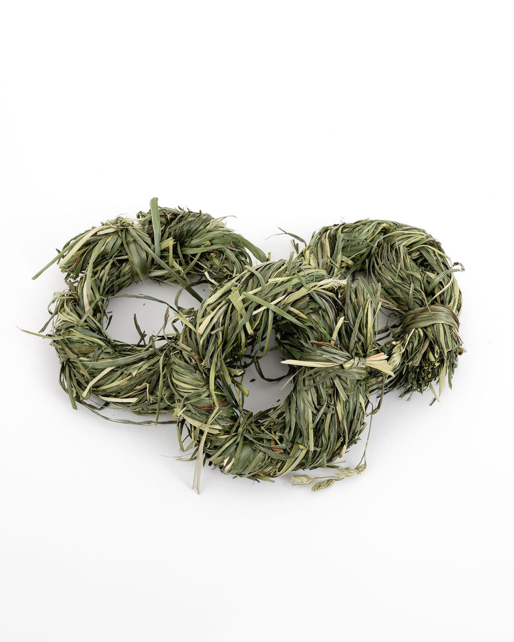 three rings made from timothy grass